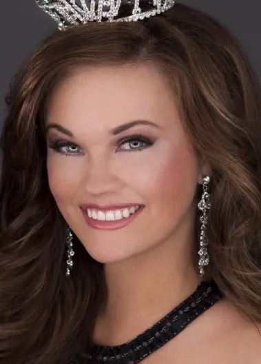 Kelsey Seaman competing in the Miss America system, wearing a crown.